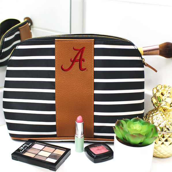 alabama cosmetic bag on bathroom counter