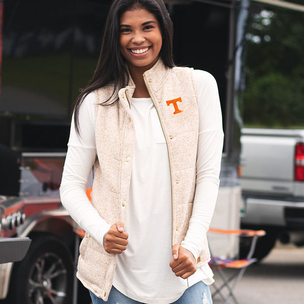 oatmeal tennessee heathered quilted vest at a tailgate