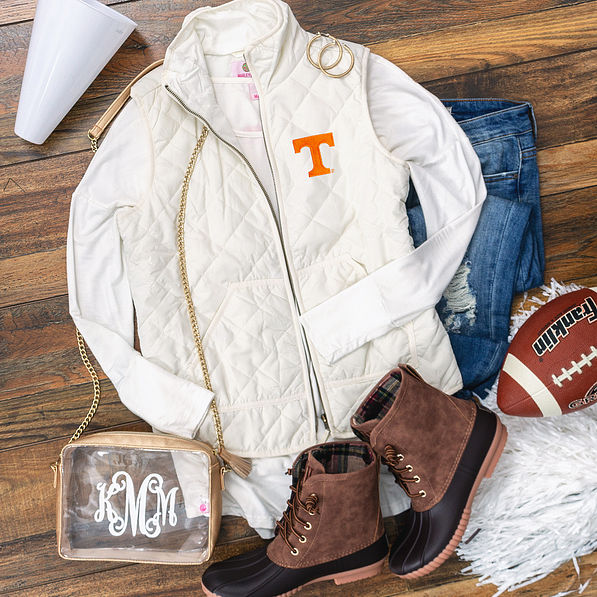 tennessee gameday outfit with puffy vest and duck boots