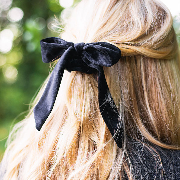 black velvet bow scrunchie in blonde hair