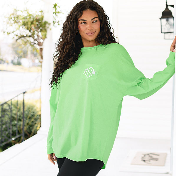 girl wearing monogrammed long sleeve shirt in lime