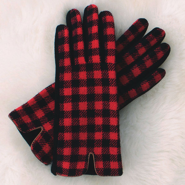 buffalo plaid gloves on faux fur rug