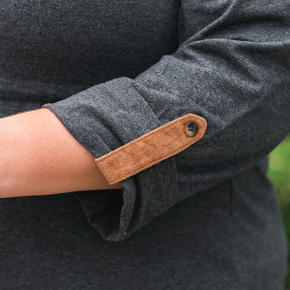 faux suede sleeve detailing on roll sleeve top