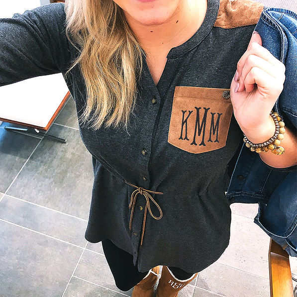 selfie of monogrammed casual utility tunic with boots
