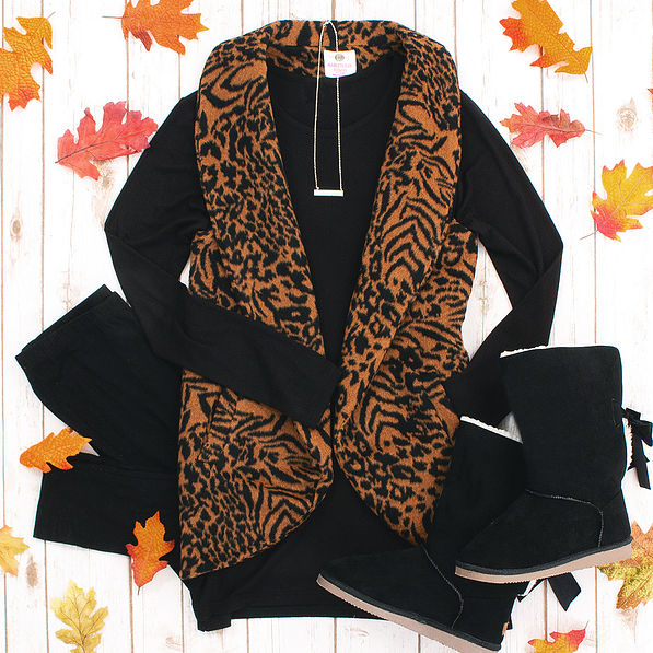 animal print fur vest with black tee and leggings