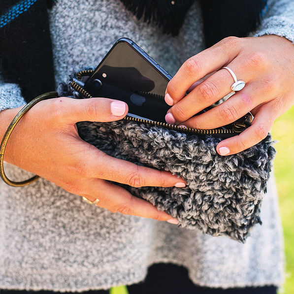 iphone inside zippered sherpa wristlet