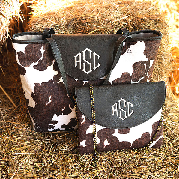 monogrammed dakota tote and crossbody on hay bales
