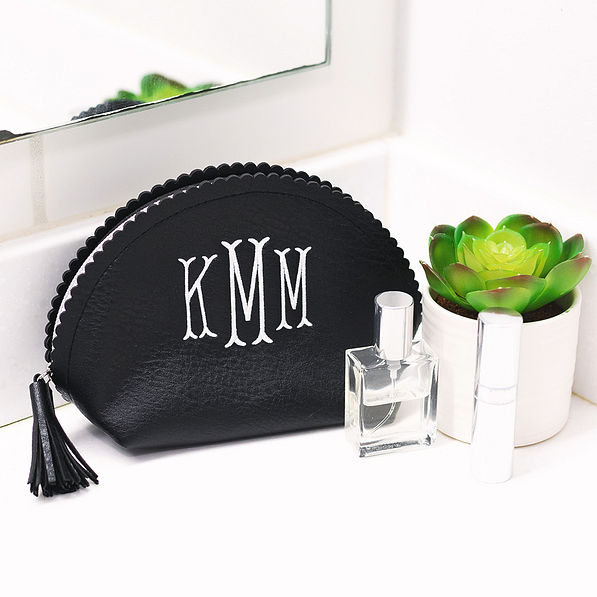 black small cosmetics case on bathroom counter