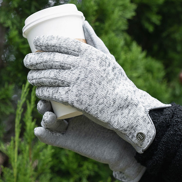 gray heathered gloves holding coffee