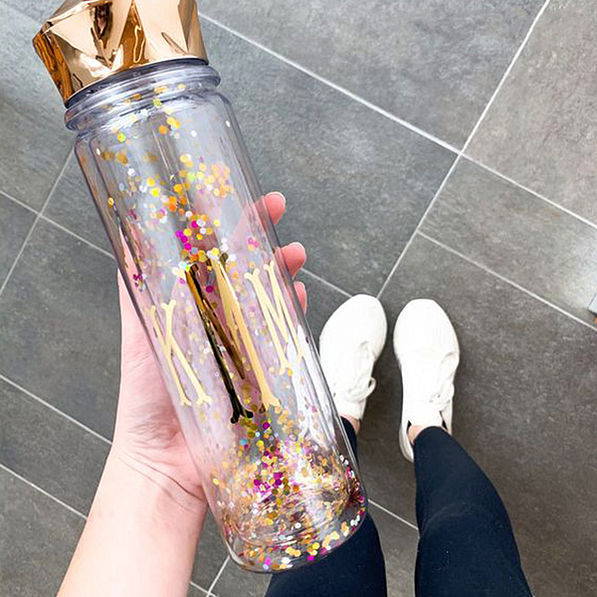 monogrammed rose gold confetti water bottle with pink