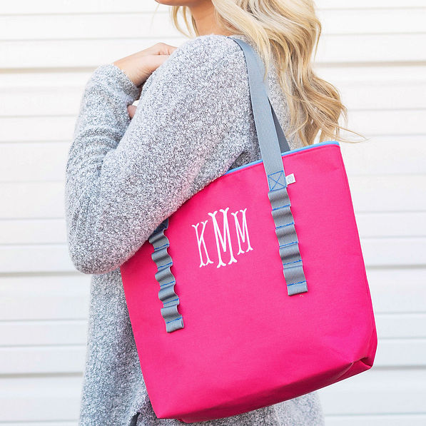 pink monogrammed tote over shoulder