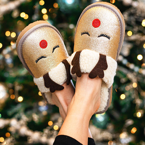 reindeer slippers in air near tree