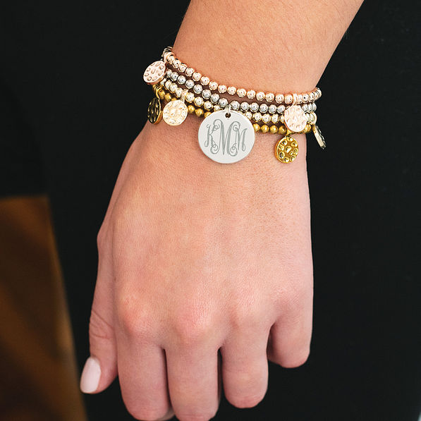 monogrammed mixed metal bracelet set on arm