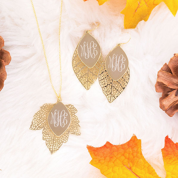 gold fall earrings with matching gold monogrammed necklace