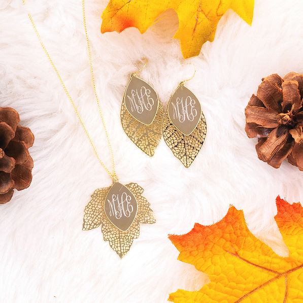 gold monogrammed leaf necklace and earrings