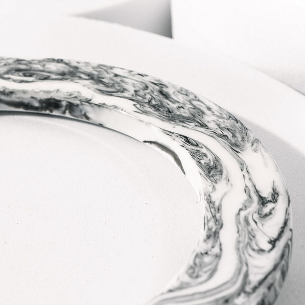 close up of monogrammed large marble key ring