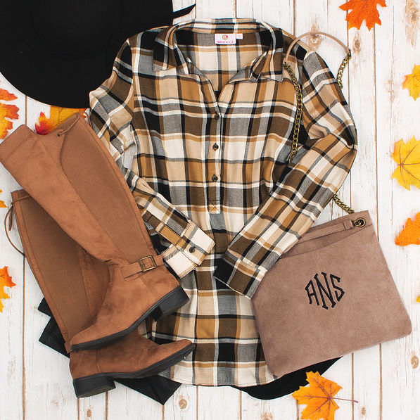monogrammed convertible suede bag with collared layering tunic and riding boots