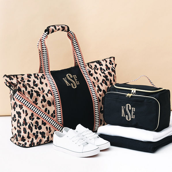 monogrammed classic cheetah weekend bag with carry all toiletry case