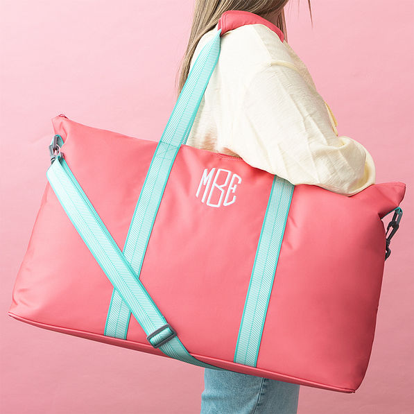 watermelon weekend bag on shoulder