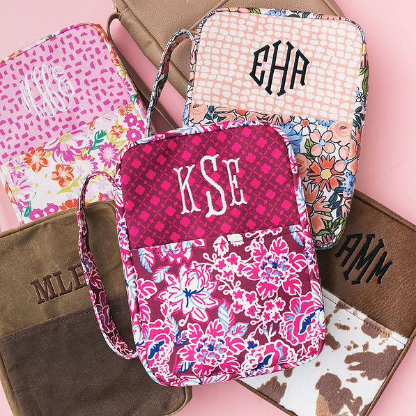 multiple monogrammed bible carriers with burgundy woodland blossom