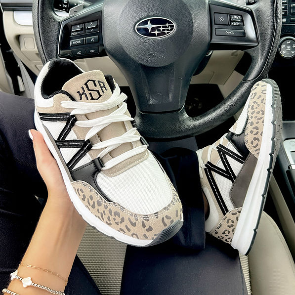 leopard sneakers in car