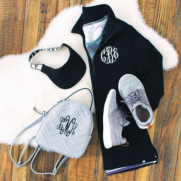 black performance visor with athleisure outfit