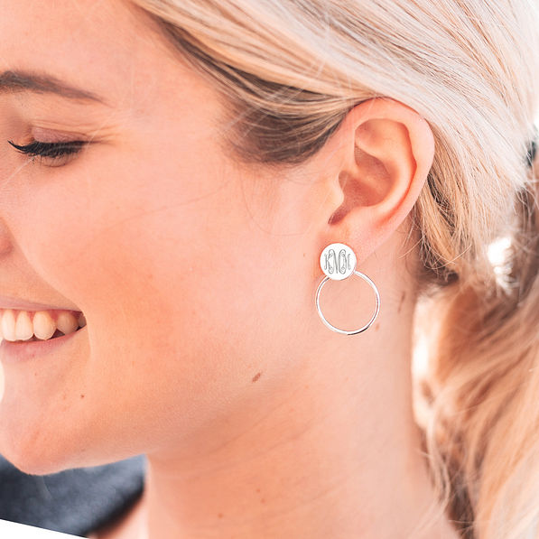 monogrammed door knocker earrings in ear