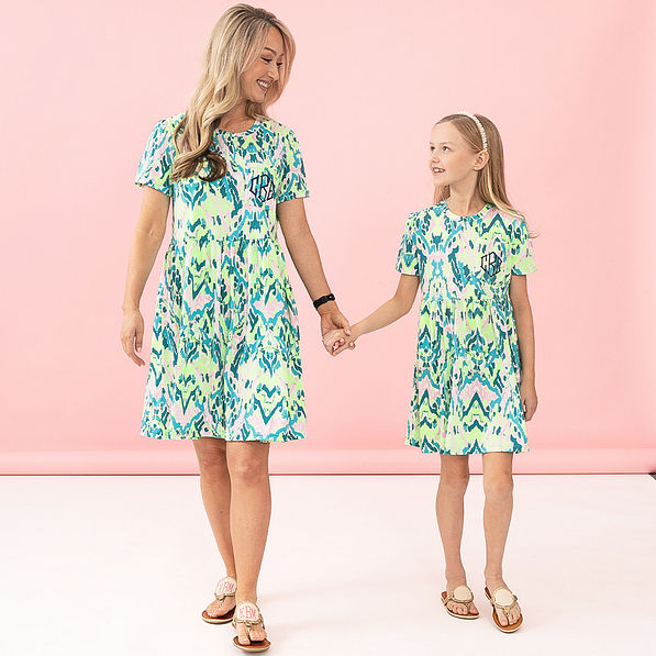 mom and girl wearing bermuda ikat t shirt dresses