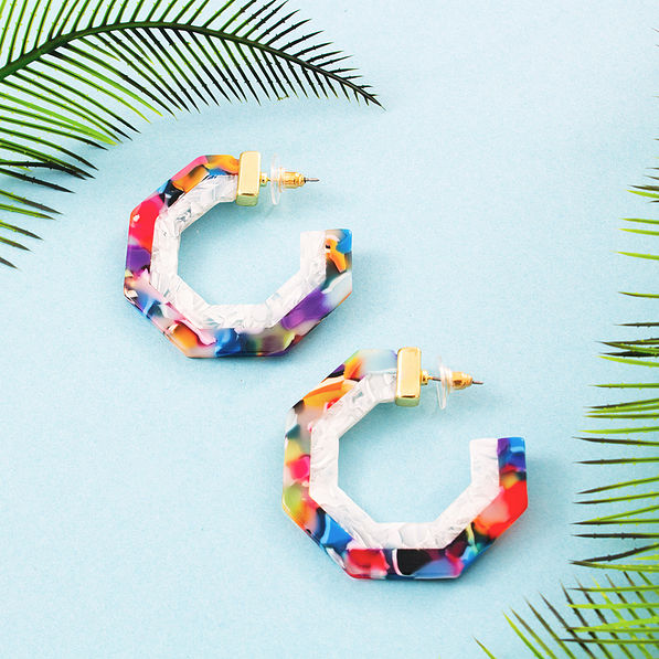 two color resin hoops on blue background