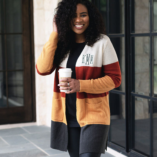colorblock cardigan with black layering tee and coffee