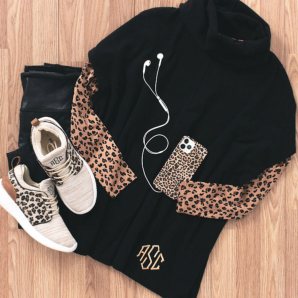 monogrammed black cowl neck tunic with leopard accessories