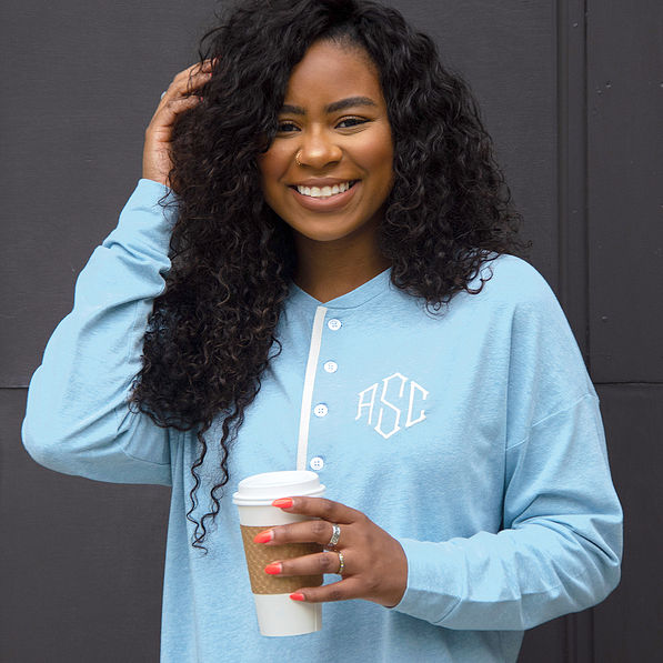 close up of monogrammed blue henley tshirt