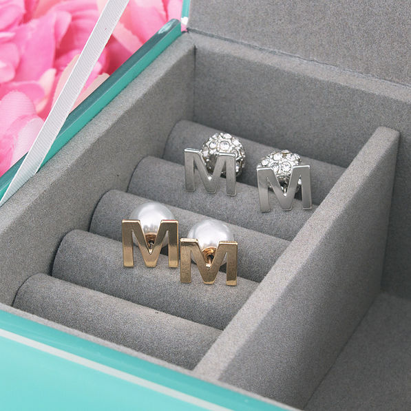 M single initial earring set in jewelry box