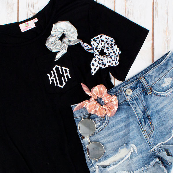 silver metallic scrunchie with leopard scrunchie and rose gold scrunchie