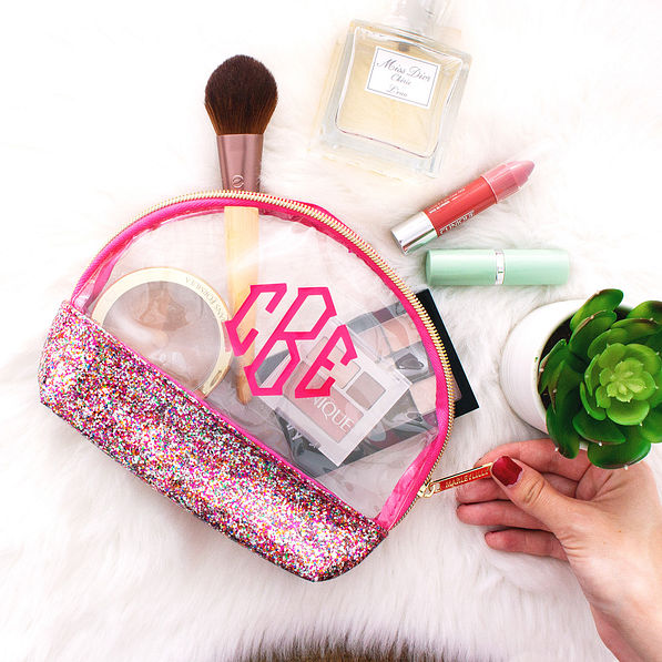 monogrammed clear cosmetic case with makeup accessories