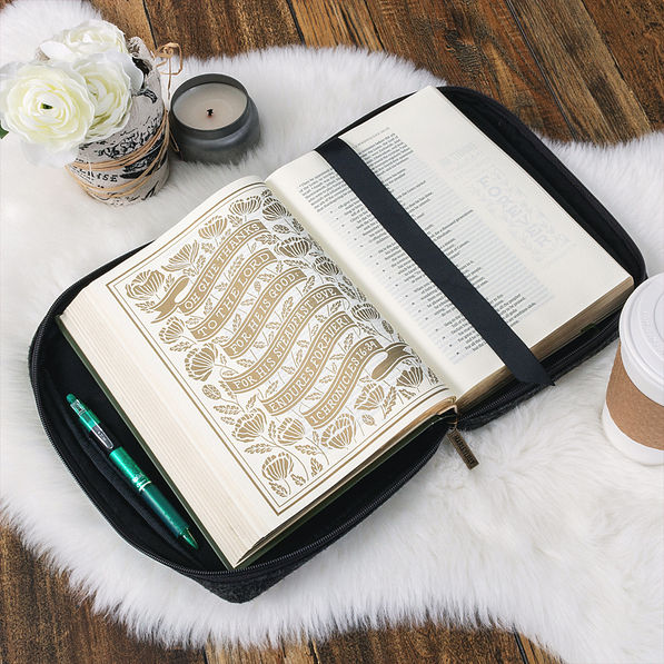 Buffalo plaid bible carrier open with bible and candle