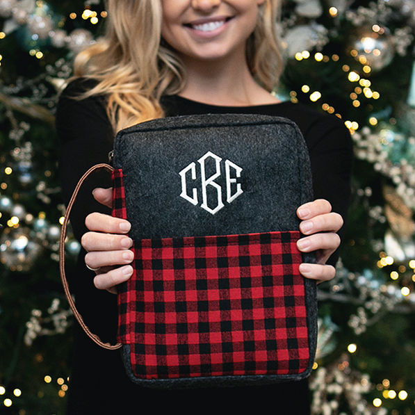 girl holding monogrammed buffalo plaid bible carrier