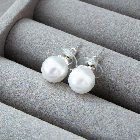 pearl stud earrings in jewelry box