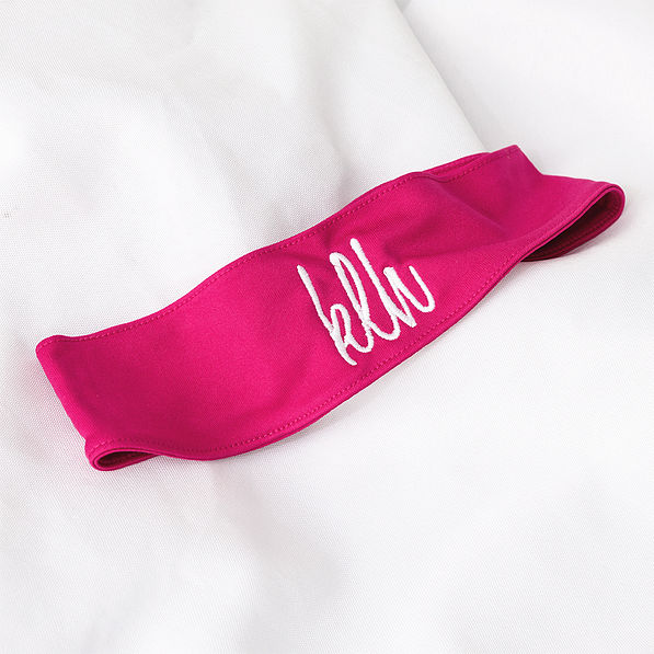 hot pink headband on white background