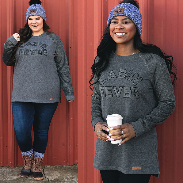 gray cabin fever sweatshirt with beanie and duck boots