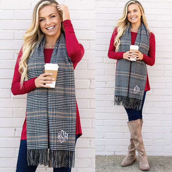 girl wearing monogrammed black herringbone scarf with red shirt and riding boots