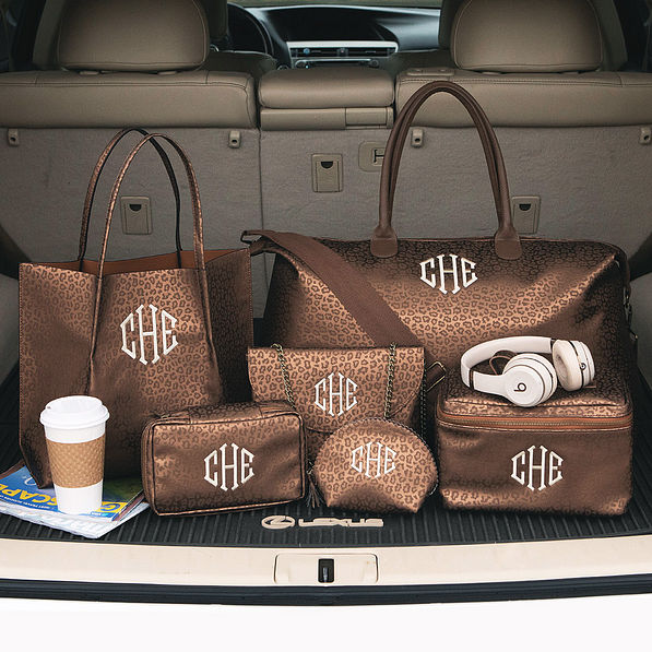 monogrammed metallic leopard collection in trunk