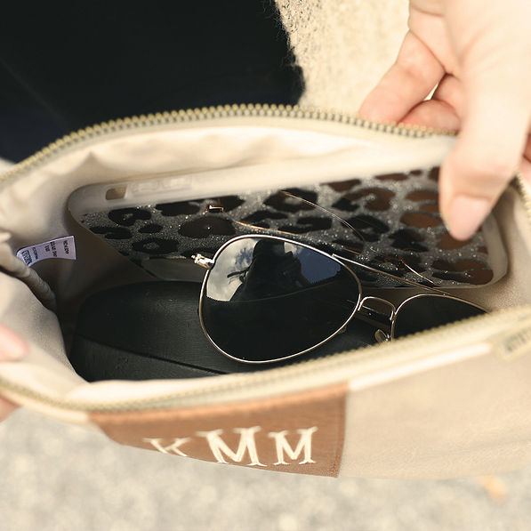 inside of tan center stripe clutch