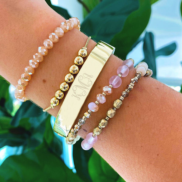 gold cuff bracelet with other bracelets