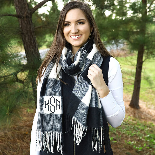 girl wearing black and ivory check scarf