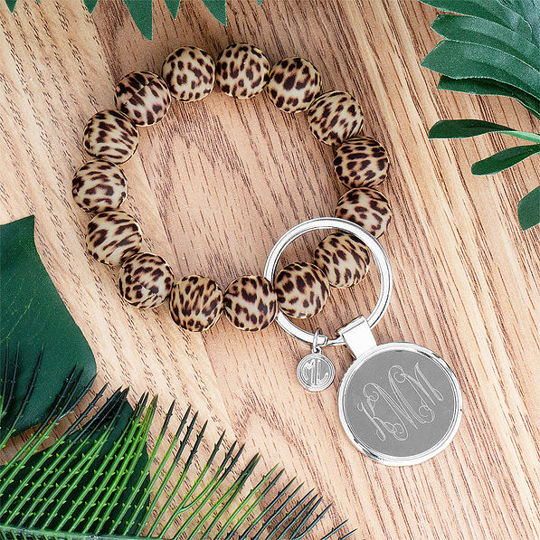 leopard bracelet key ring in jungle background