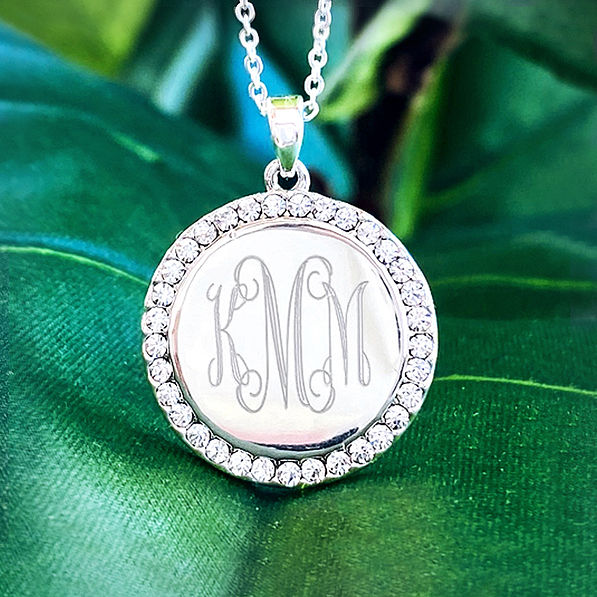 detail shot of rhinestone disc pendant necklace