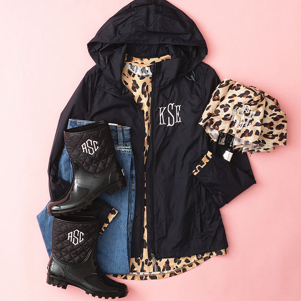 black lightweight rain jacket flatlay