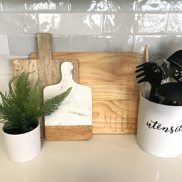monogrammed wood cutting board display