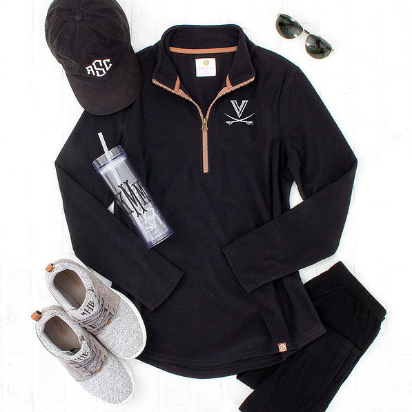 uva fleece pullover in black with sneakers